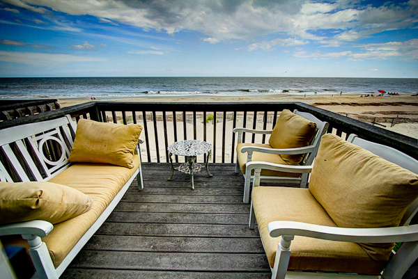 Private deck overlooks Tybee beach from Ocean Villa.